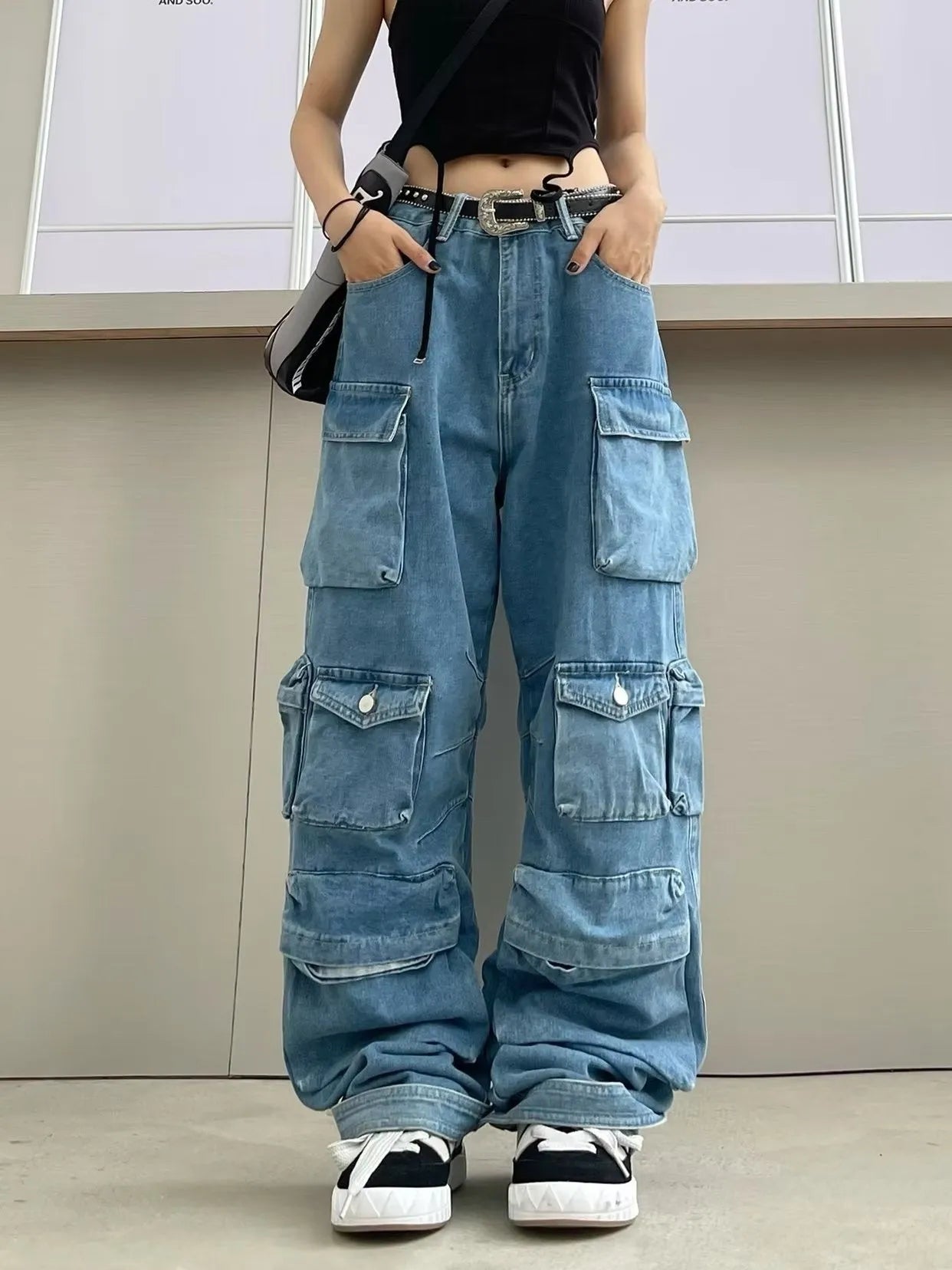 Women's high waist wide leg trousers with tie-dyed denim and multiple pockets in blue colour