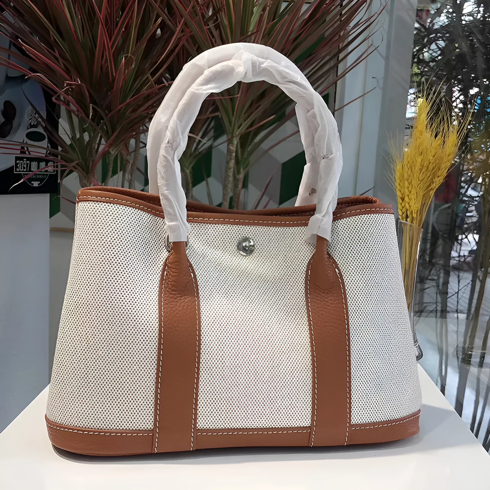 Genuine leather crossbody bucket tote bag with canvas surface in multiple colour options