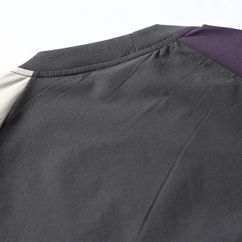 Dark grey men's t-shirt with contrast colour raglan sleeves and loose fit design