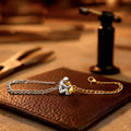 Women's gold-plated copper bracelet in gold finish with solid link construction