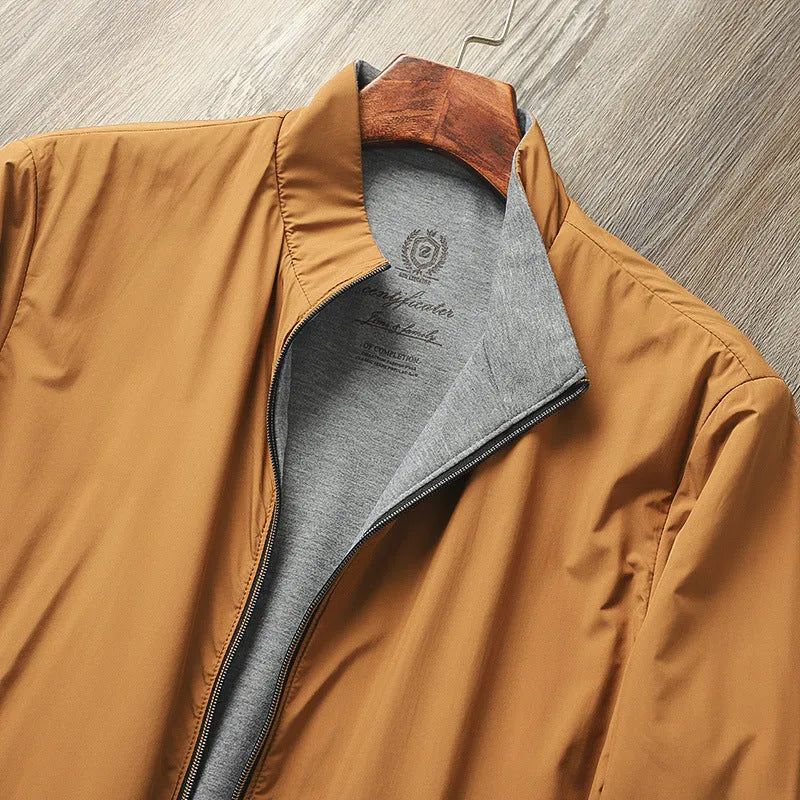 Men's simple stand collar jacket in polyester and cotton blend shown in one of four available colours.