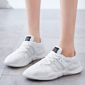 Breathable mesh sneaker with hollow-out design and a flat EVA sole, shown in a light colour on a neutral background.