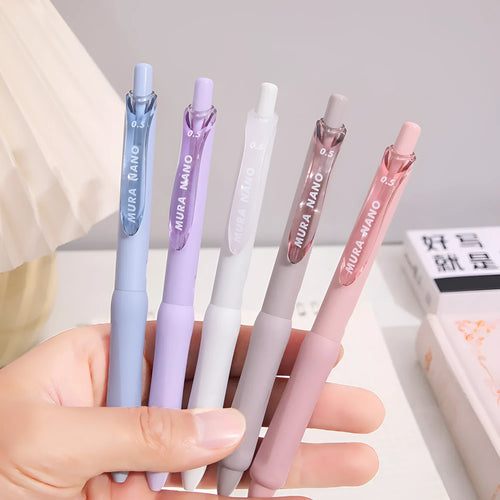 0.5mm Macaron colour press gel pen in smoked brown, white, and pink options.