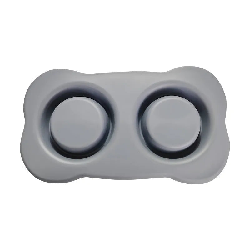 Large double dog bowl with stainless steel inserts in a grey silicone tray for two dogs.