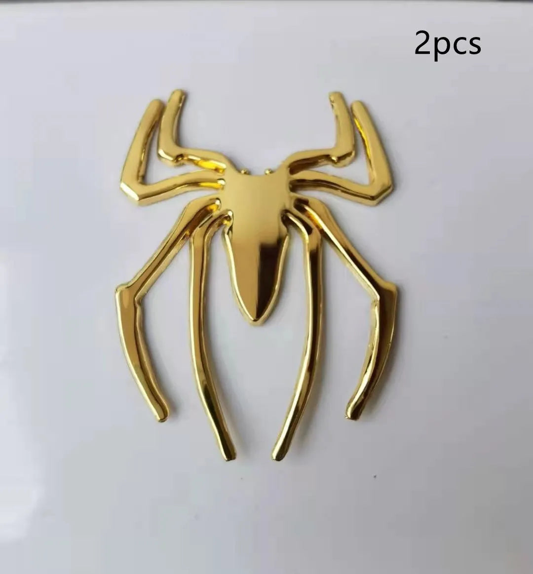 Three-dimensional metal spider bumper sticker in zinc alloy, showing detailed design