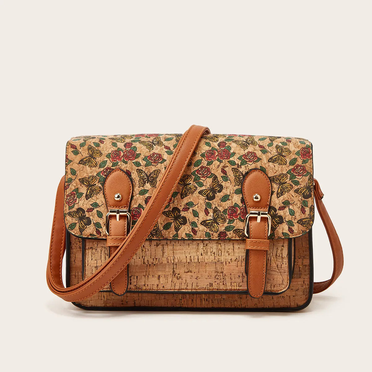 Women's large crossbody bag in a printed PU material with a single shoulder strap.