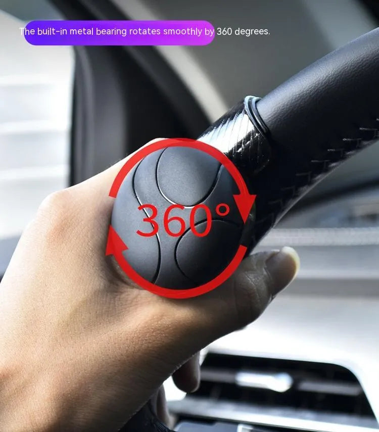 Silicone-covered steering wheel assistance ball with metal bearing for single-handed driving