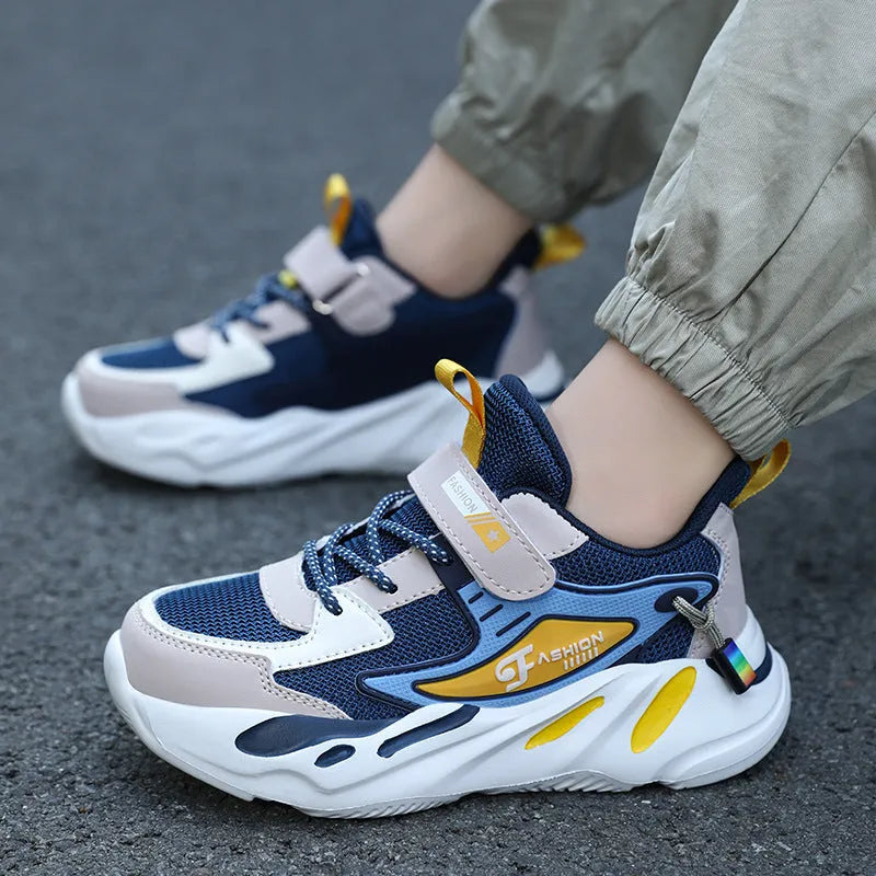 Boy's dark blue and black Velcro-fastened platform sports running shoes with breathable mesh upper.
