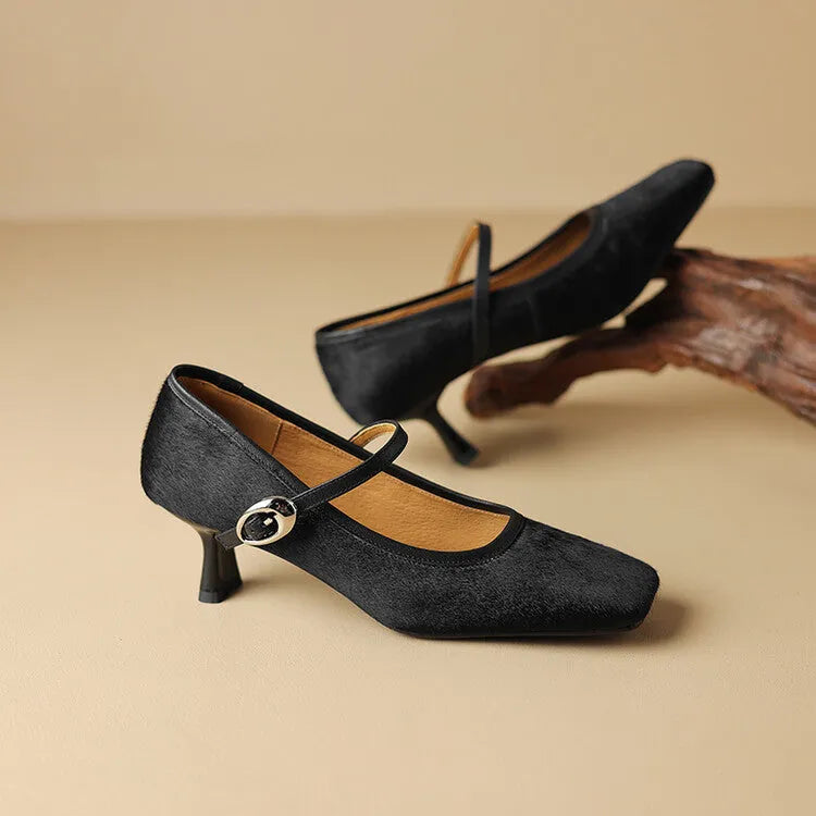 Women's black square toe stiletto ankle-strap heels with a horse hair upper.