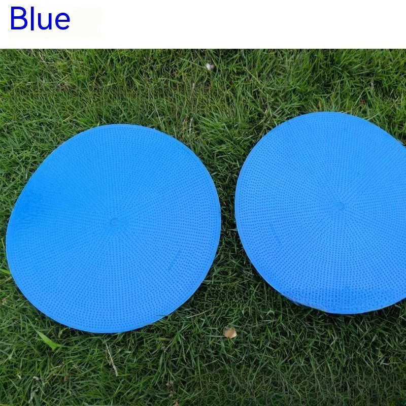 Soft yellow TPE football training landmark pad on grass, showing 23cm diameter.
