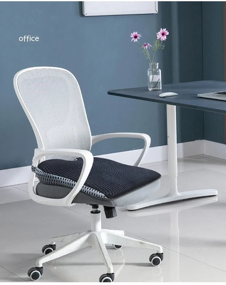 Memory foam seat cushion in grey with elastic strap on a car seat