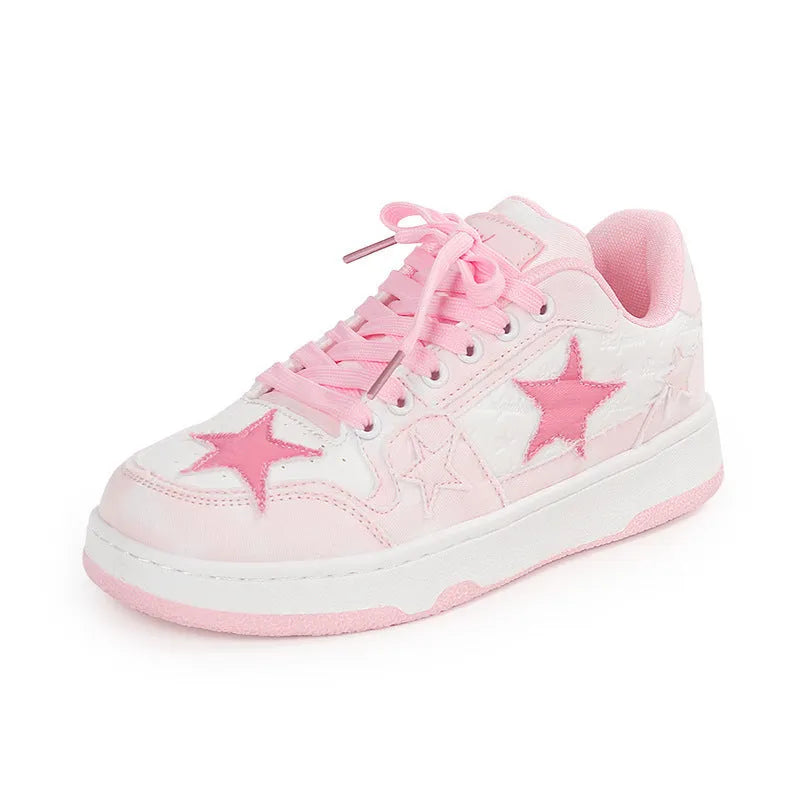 A pair of denim lace-up skate shoes with a rubber sole, shown in black, green, and pink colour options.