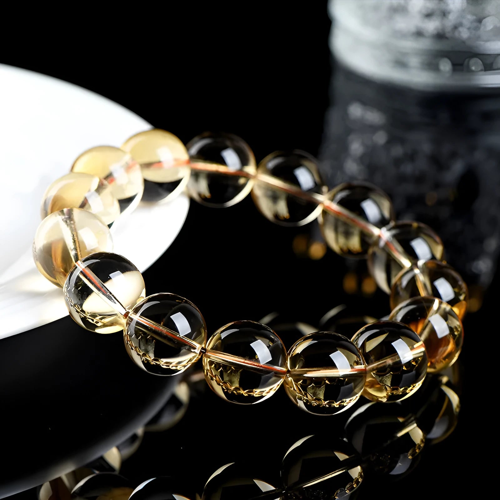 Natural citrine scattered beads ball bracelet showing polished gemstone beads on a wrist.