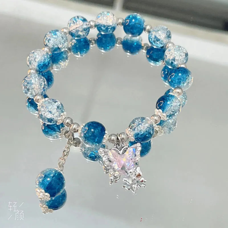 Handmade Chinese style glass bracelet with bamboo joint beads in a red Lvzhu Duobao design.