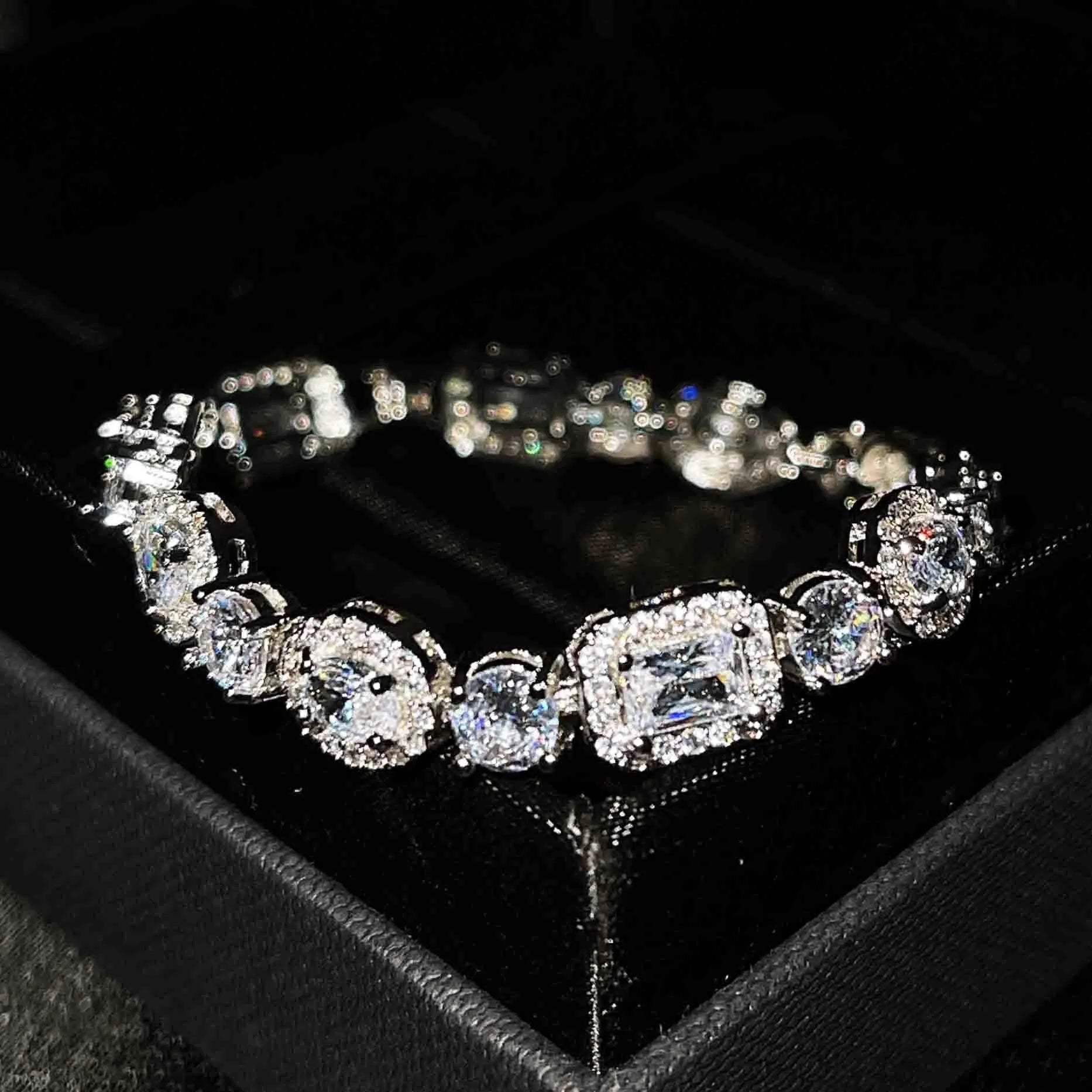 Women's white gold plated geometric bracelet with zircon stones in two length options.