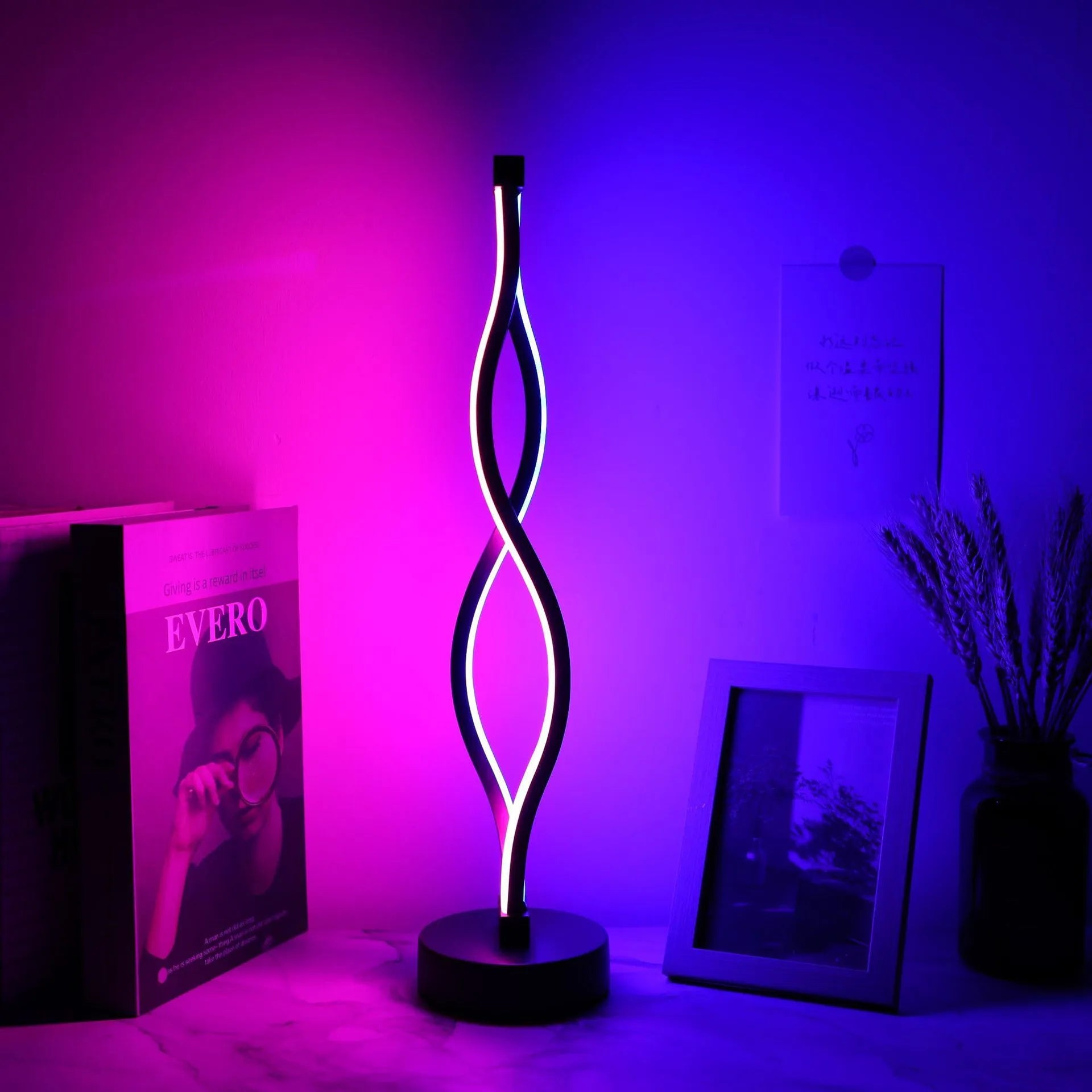 Black aluminium desk lamp with touch dimming controls and USB power cable