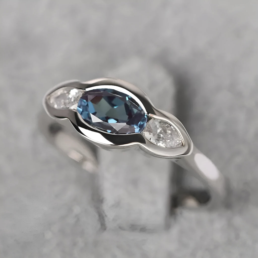 Women's geometric ellipse copper ring with white gold plating and zircon stones in UK sizes 6 to 10