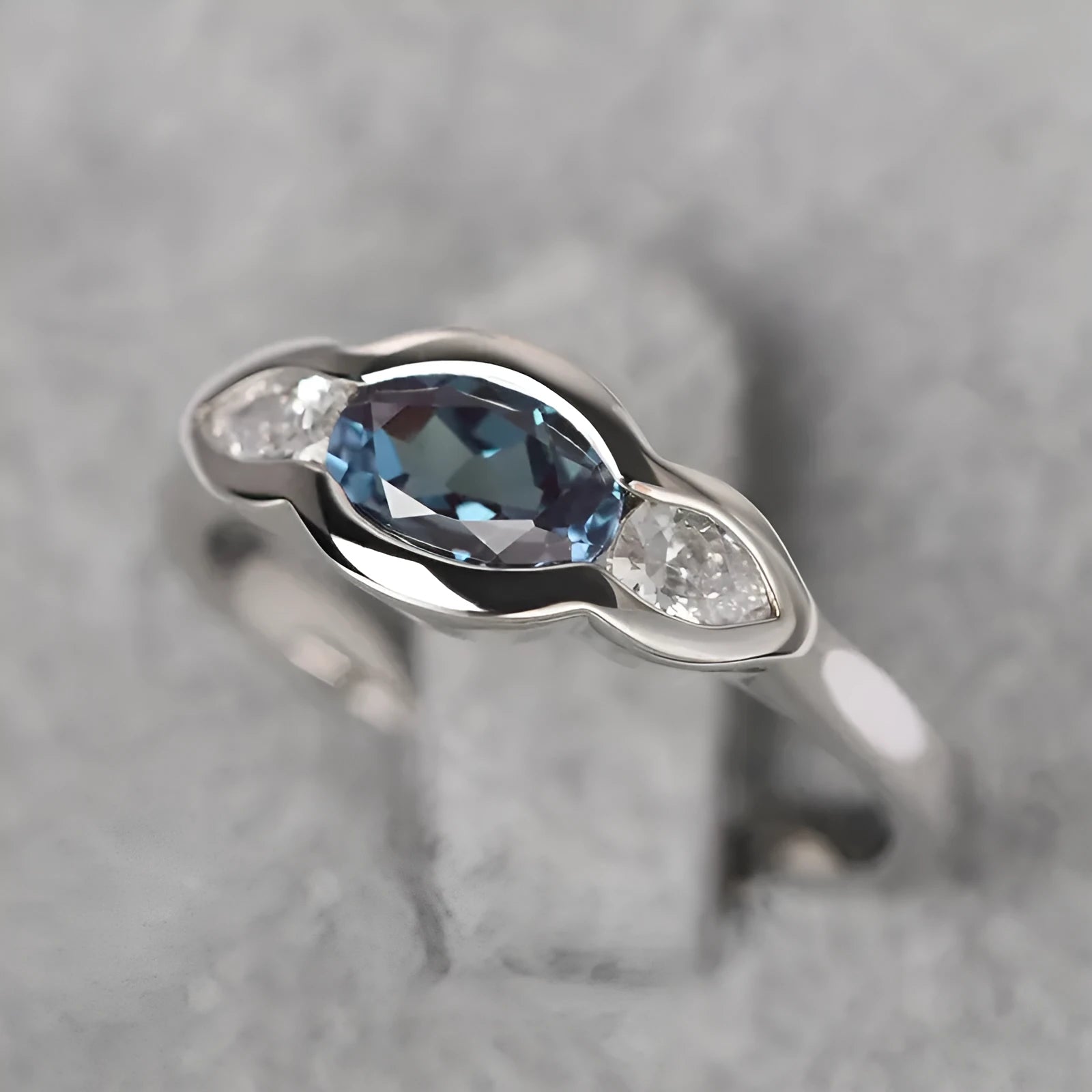 Women's geometric ellipse copper ring with white gold plating and zircon stones in UK sizes 6 to 10