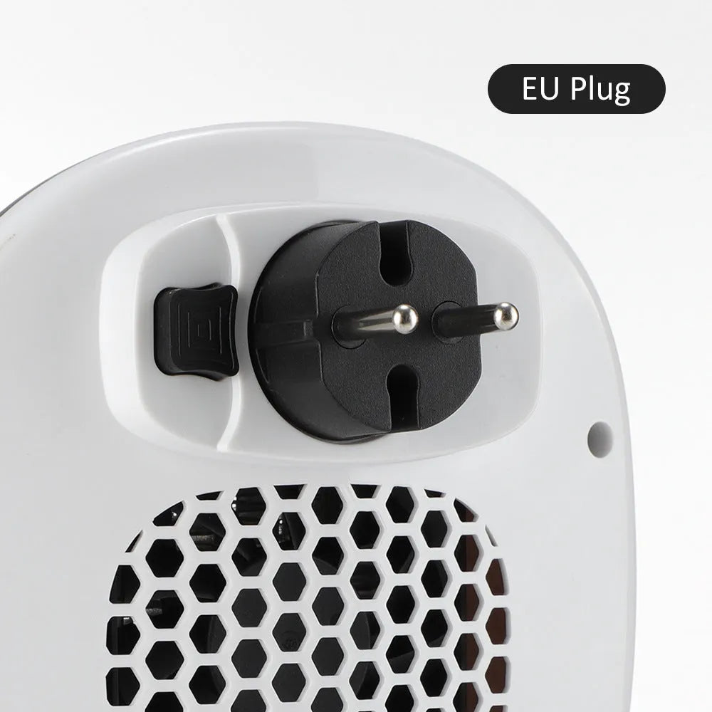 White ceramic heating electric hot air blower heater with remote control on a table.