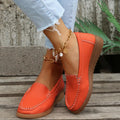 Women's flat loafer shoes in PU leather, showing round toe and car suture detail, on a rubber sole.