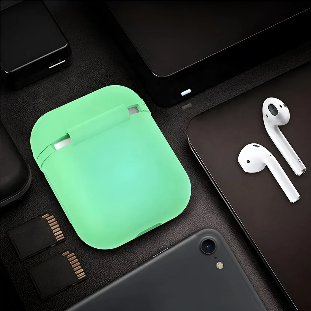 Luminous silicone protective case for Apple AirPods with flip-top design glowing in dark