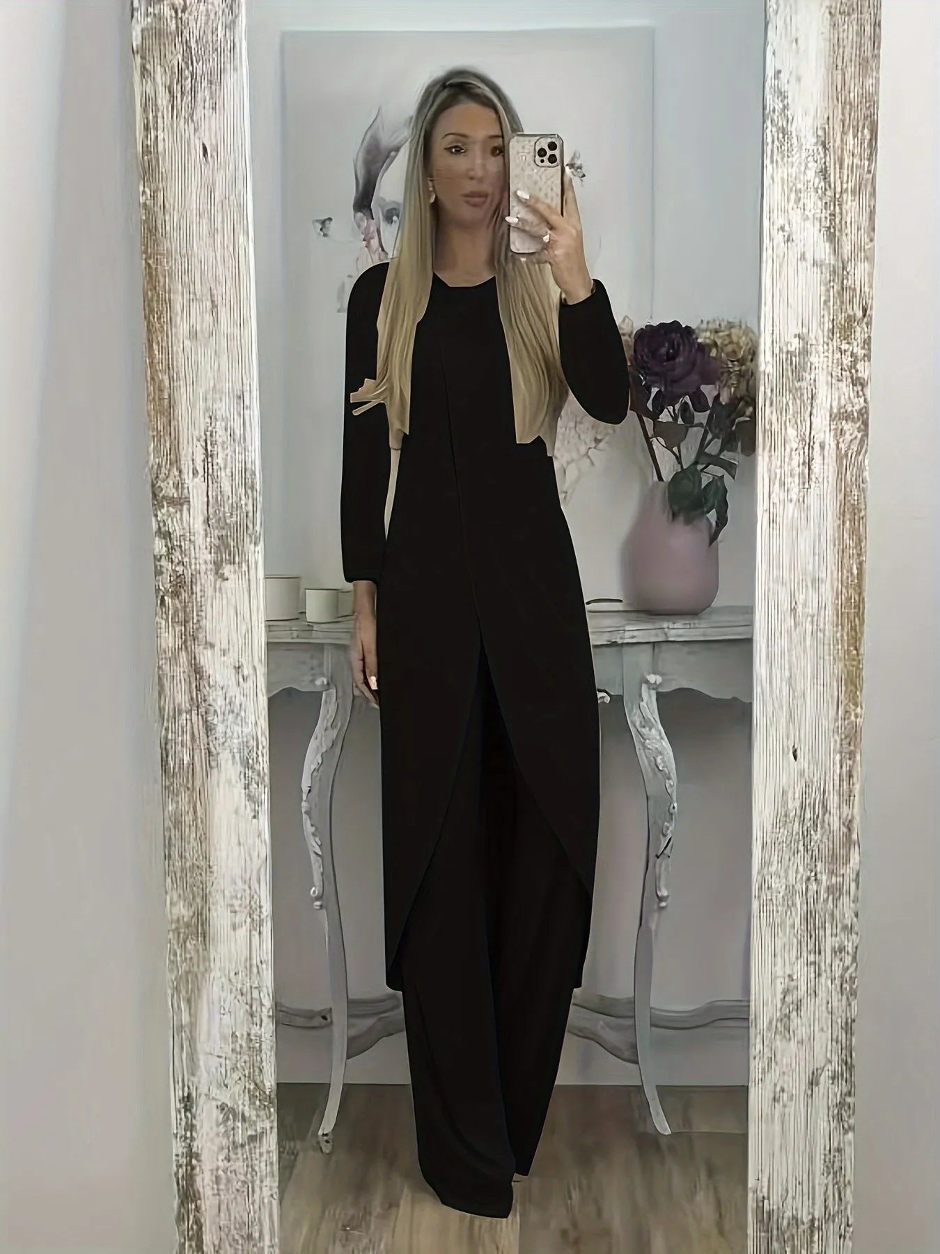 A loose-fitting long sleeve two-piece lounge set in polyester, shown in khaki colour, consisting of a round-neck top and matching trousers.