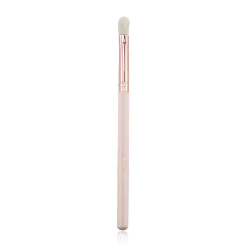 26 pink makeup brushes with wood handles arranged in a PU travel pouch.