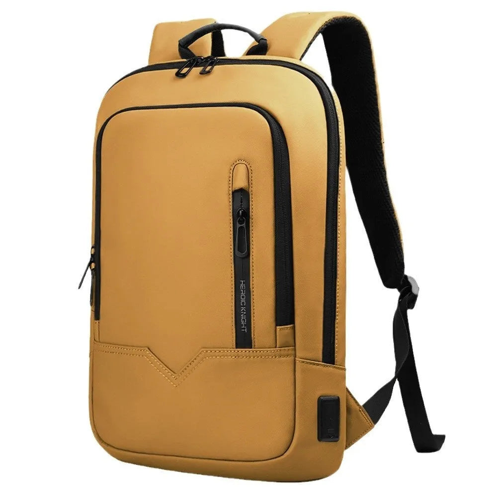 Solid colour lightweight polyester backpack with USB charging port on side, shown in multiple colour options.