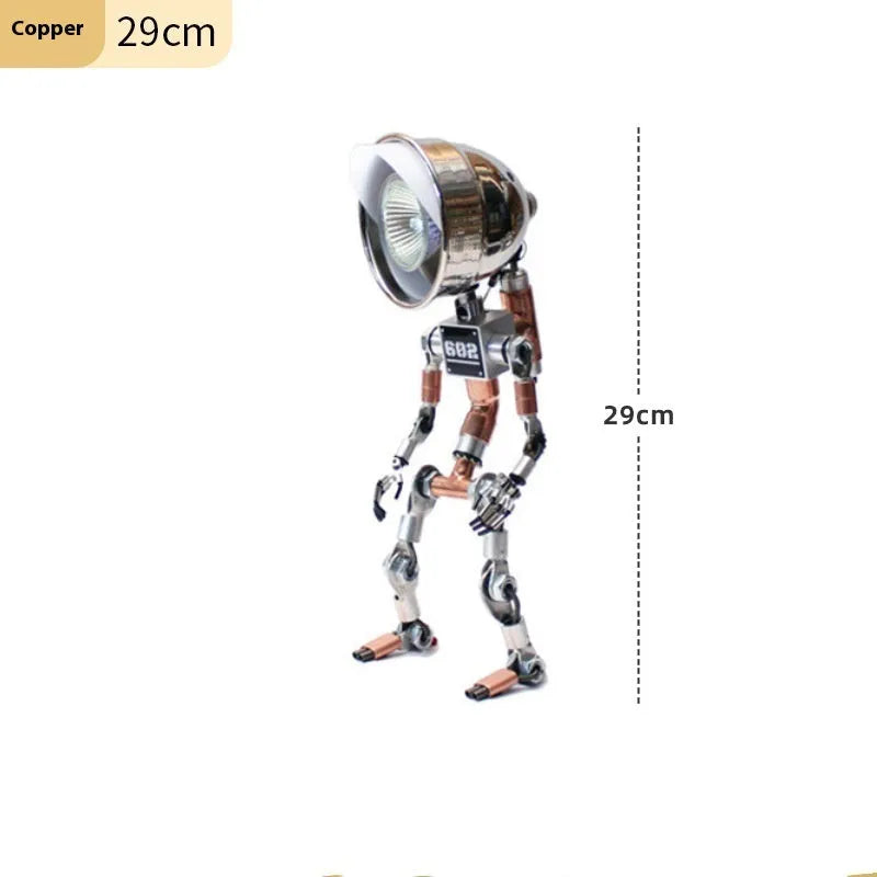 Silver copper robot-shaped atmosphere light with graphic customisation on a desk.