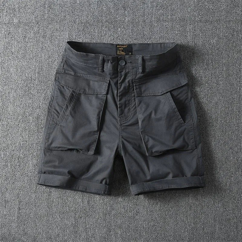 Men's army green cotton cargo shorts with multiple pockets on a straight leg.