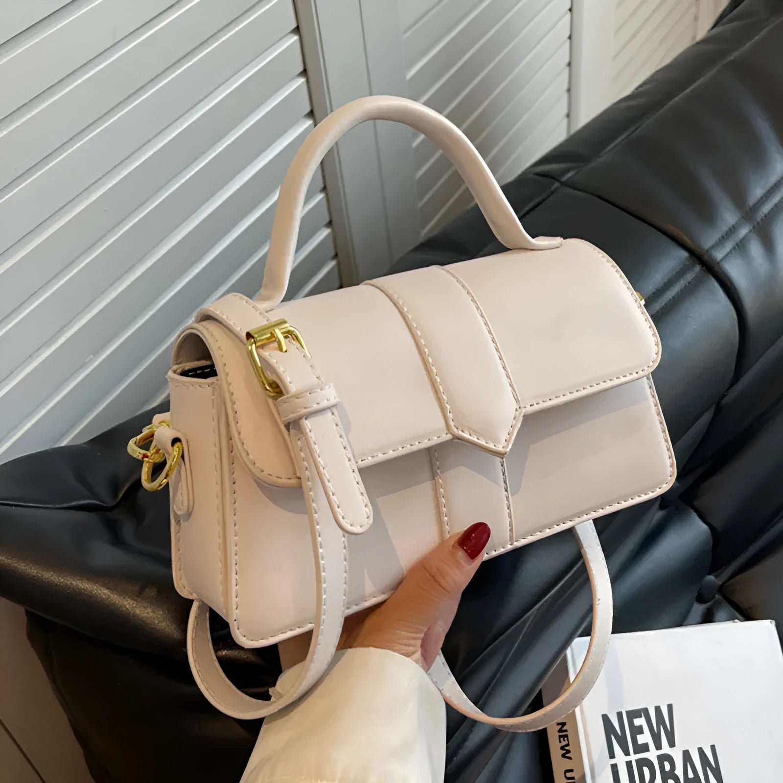 Women's beige PU leather horizontal square messenger bag with crossbody strap and external pocket