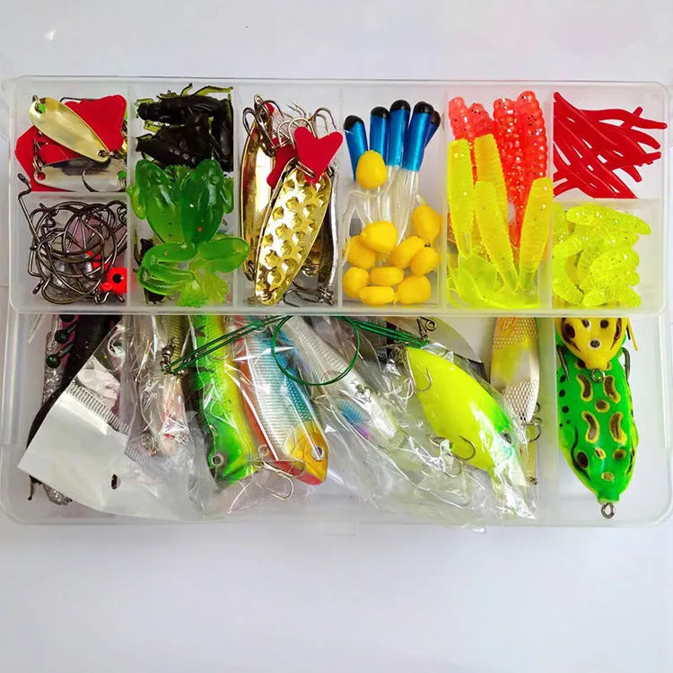 142-piece fishing lure kit with hard minnow lures, sequins, fishhooks, and metal fishing pliers laid out.