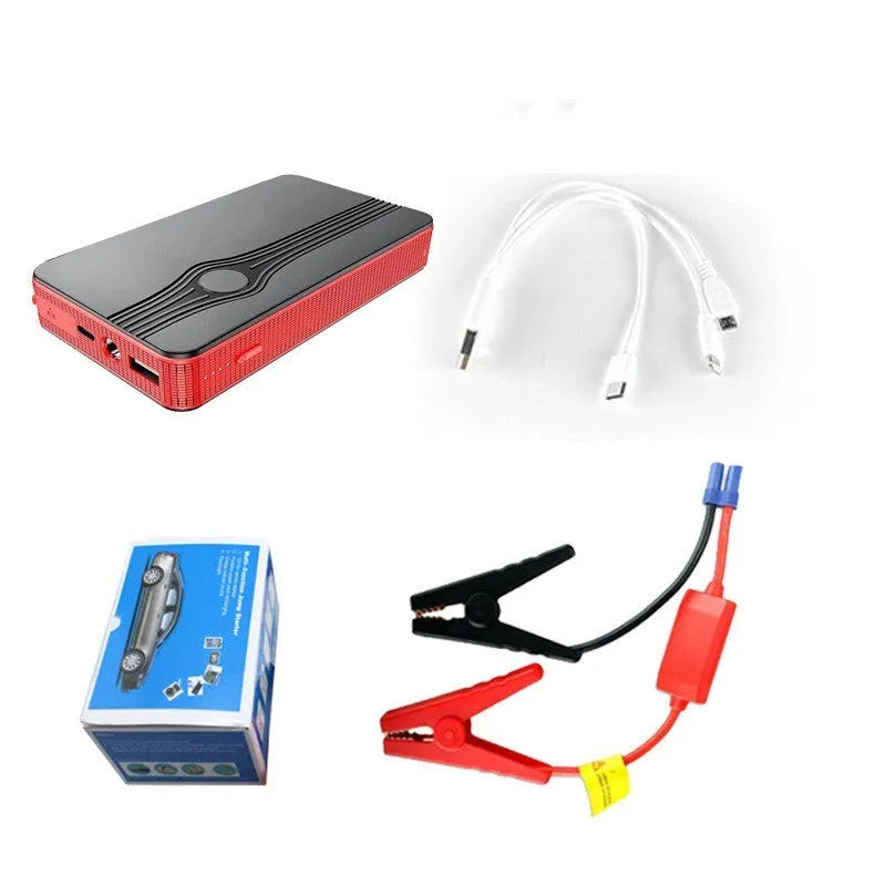 Red K4-E automobile emergency starting power supply and USB power bank unit on a grey surface.