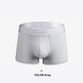 Men's solid colour cotton boxer shorts showing available black, white, silver grey, and light green options