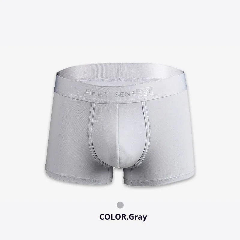 Men's solid colour cotton boxer shorts showing available black, white, silver grey, and light green options