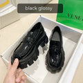 British style wide fit loafers for men and women in either matte or glossy patent leather.