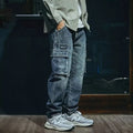 Men's blue loose straight-leg retro trousers with zip fly on size chart background
