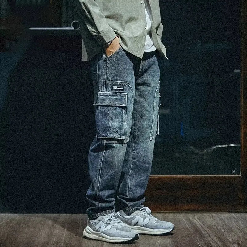 Men's blue loose straight-leg retro trousers with zip fly on size chart background