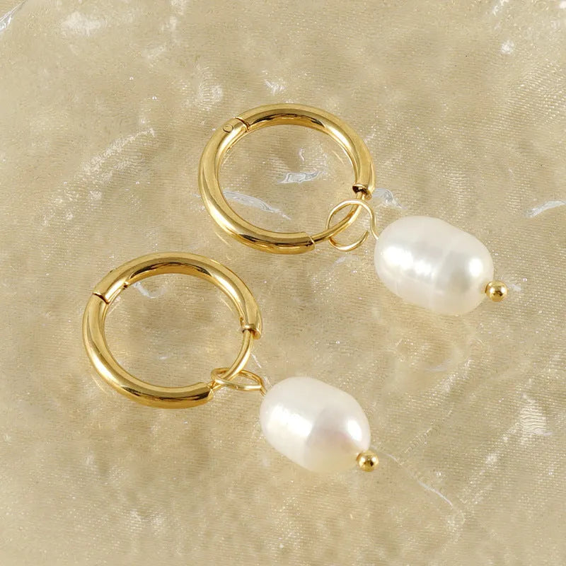 Gold geometric pearl earrings for women made from stainless steel with electroplated finish.
