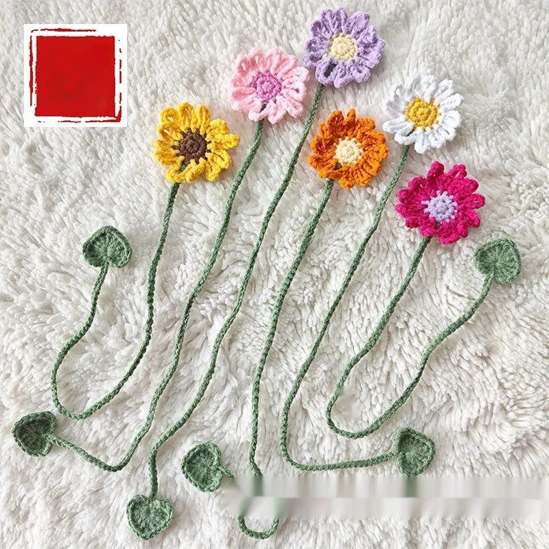 Hand-crocheted wool bookmark with daisy motifs on flexible wire in multiple colour options