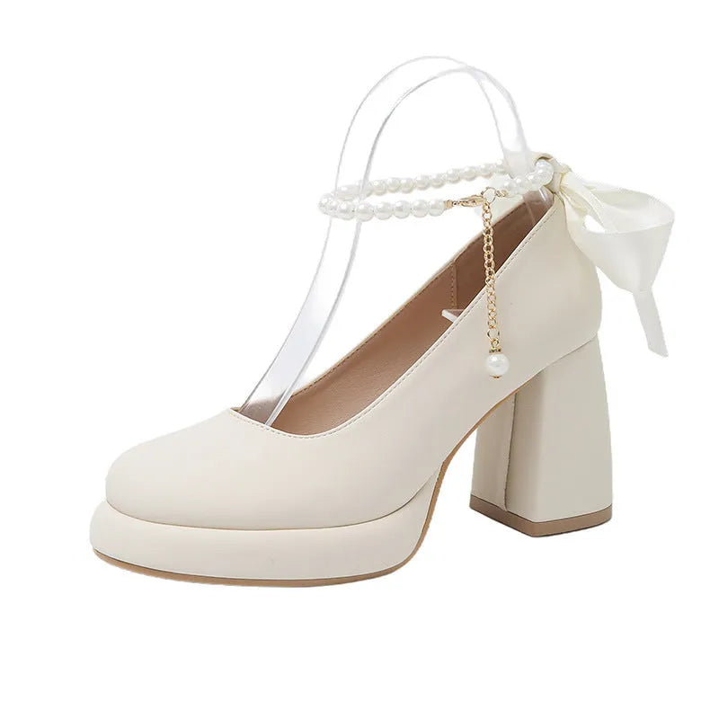 Women's beige Mary Jane shoes with chunky heel and ankle-strap buckle on round toe