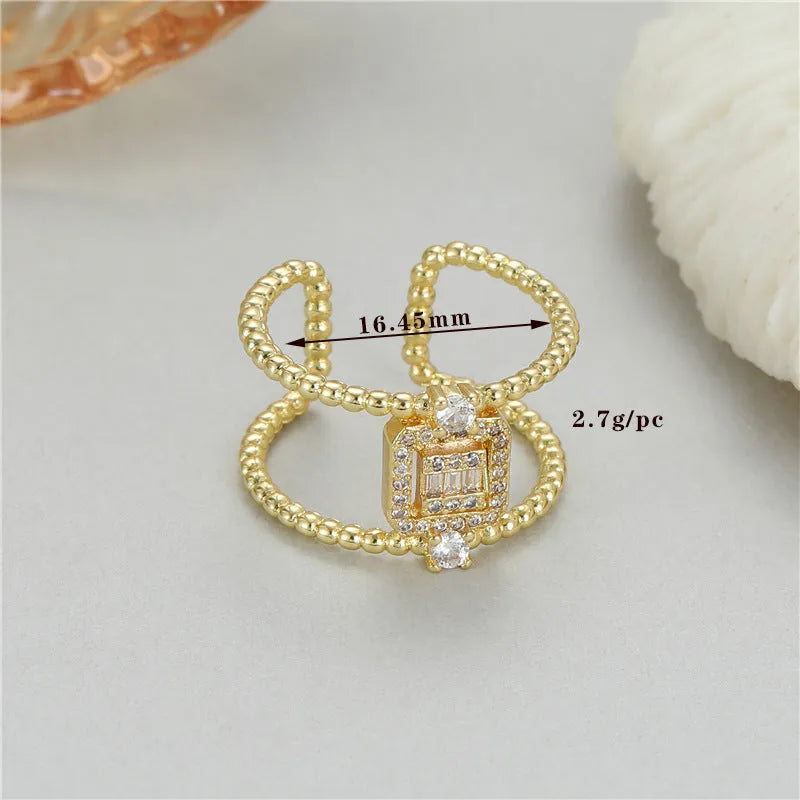 Copper open ring with adjustable opening and asymmetric U-shaped design in gold finish