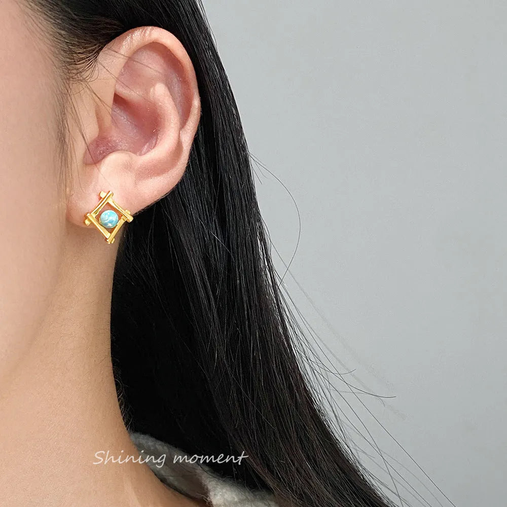 Women's geometric cross quadrangle stud earrings in 925 silver with butterfly clutch closures