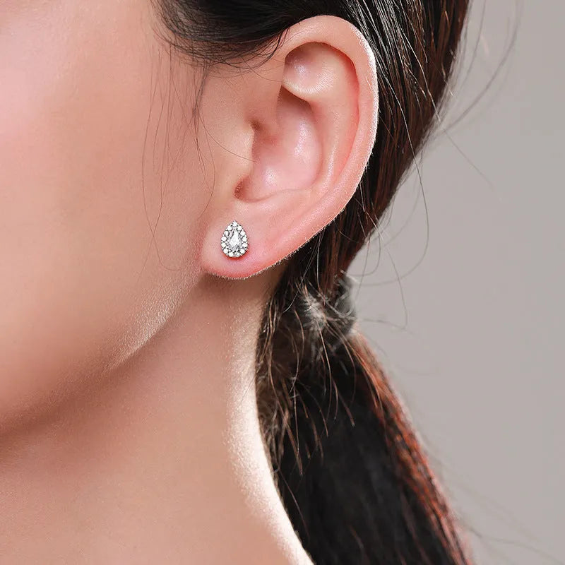 Women's silver drop ear studs with 925 sterling silver and diamond treatment process