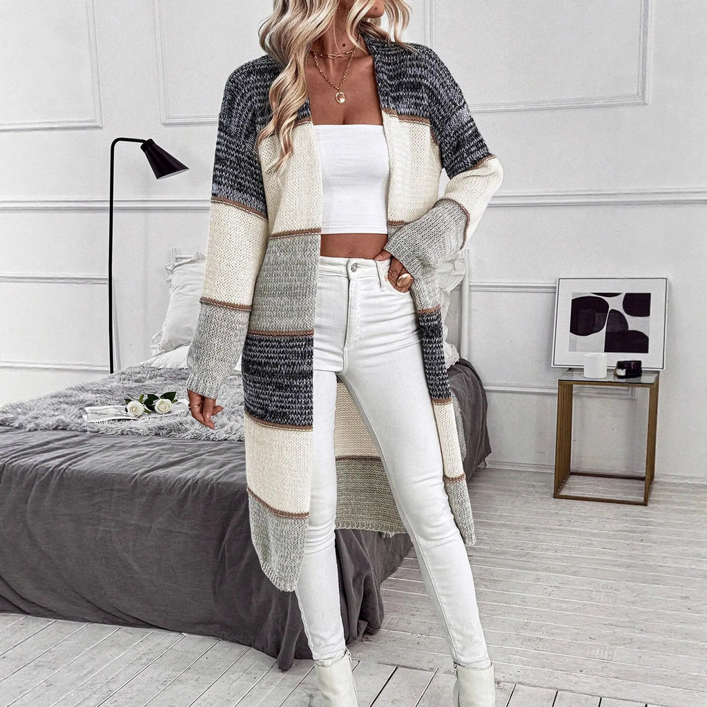 Grey striped knitted cardigan with loose fit and long sleeves