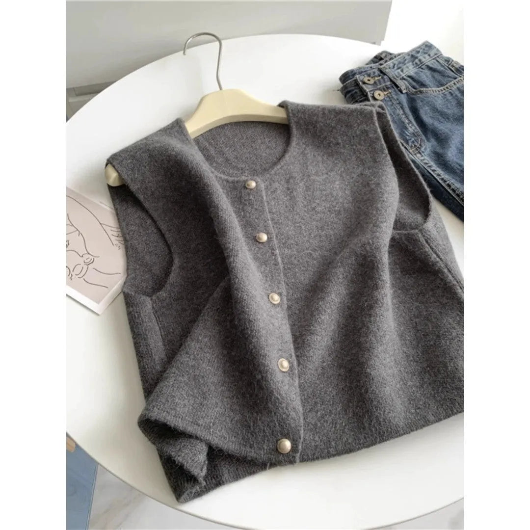 Women's polyester pullover vest with half sleeves in smoky grey, available in medium and large sizes by weight