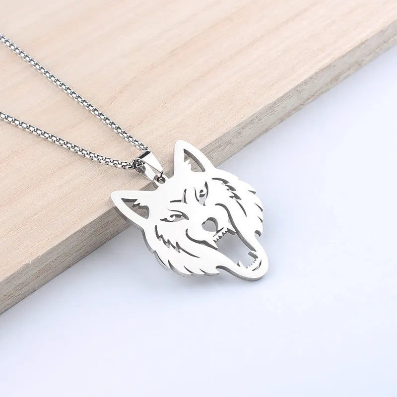 Hollow wolf head stainless steel pendant necklace with polished finish and 60cm chain on neutral background