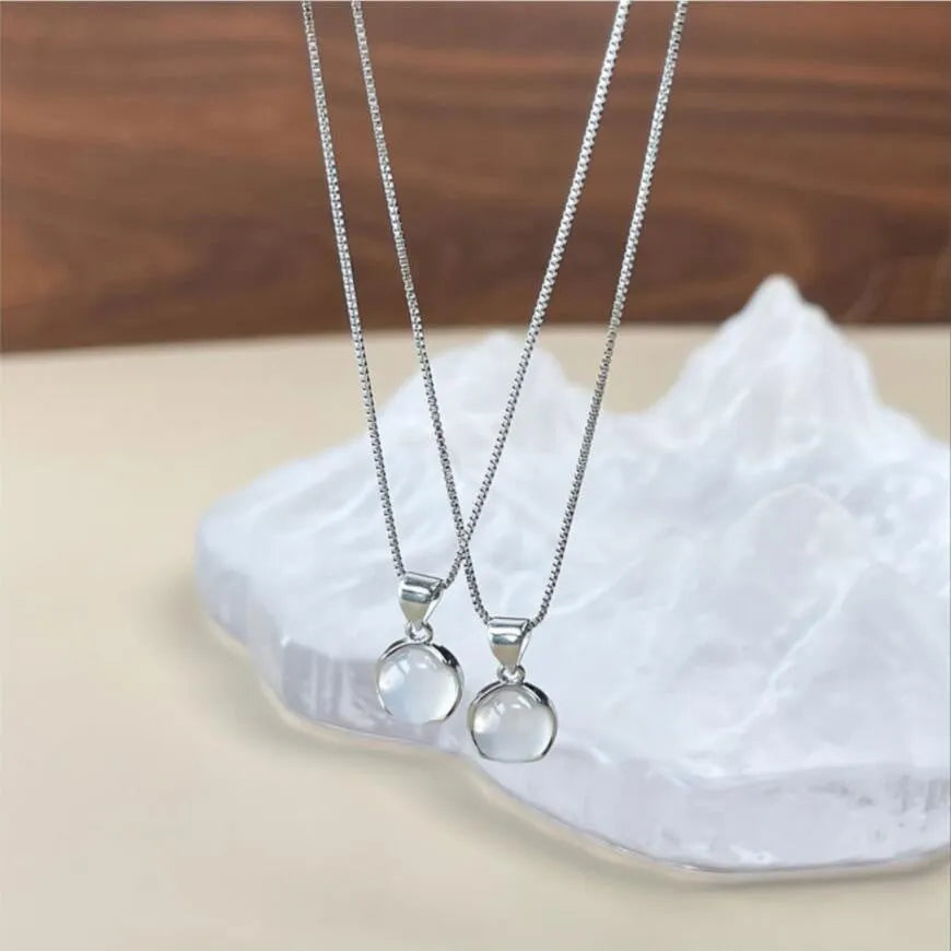 Korean-style oval pendant necklace with geometric crystal design on adjustable box chain