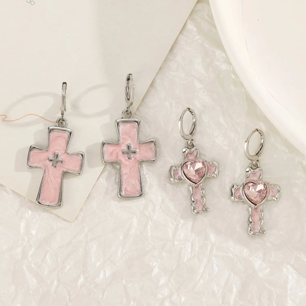 Women's alloy earrings with crystal cross designs in five colour options including white, peach heart, and antique silver