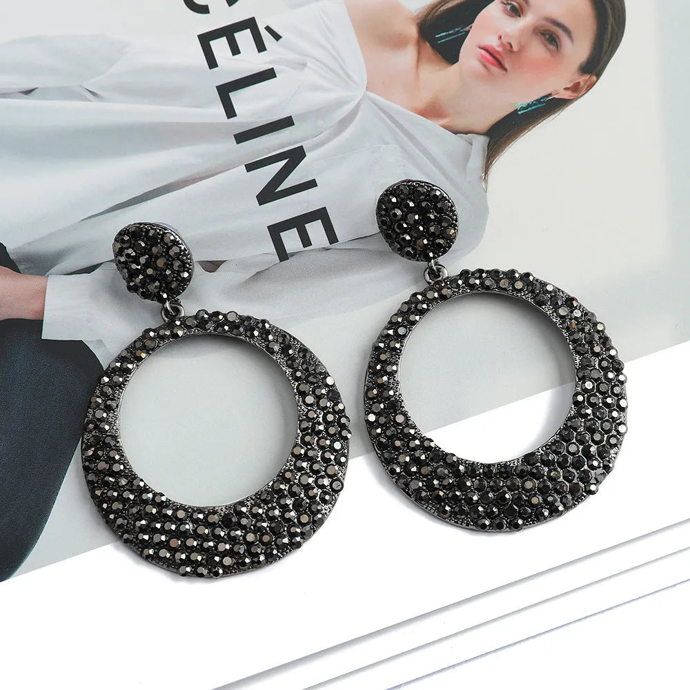 Large round pendant earrings with colourful diamond decoration in cartoon style design